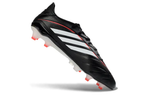 Adidas Copa Pure IV Elite FG football in action with player kicking the ball on a grass field